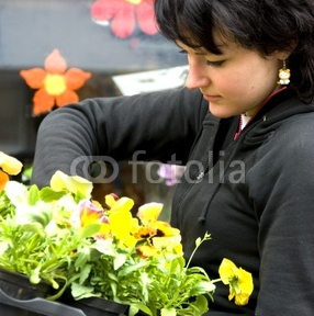 young_florist_with_spring_flowers.jpg